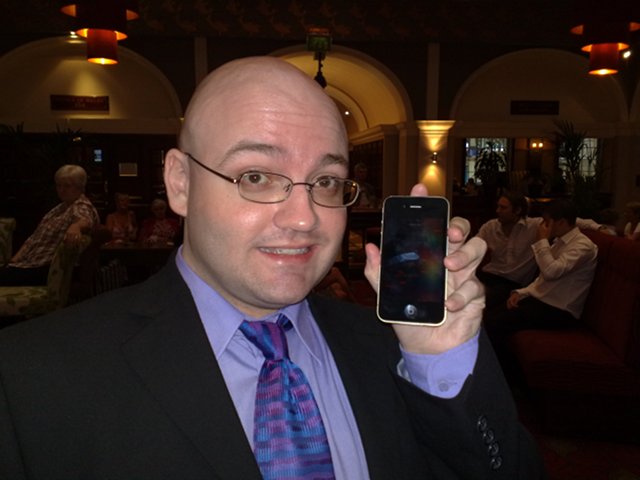 David testing the best man's iPhone 4
