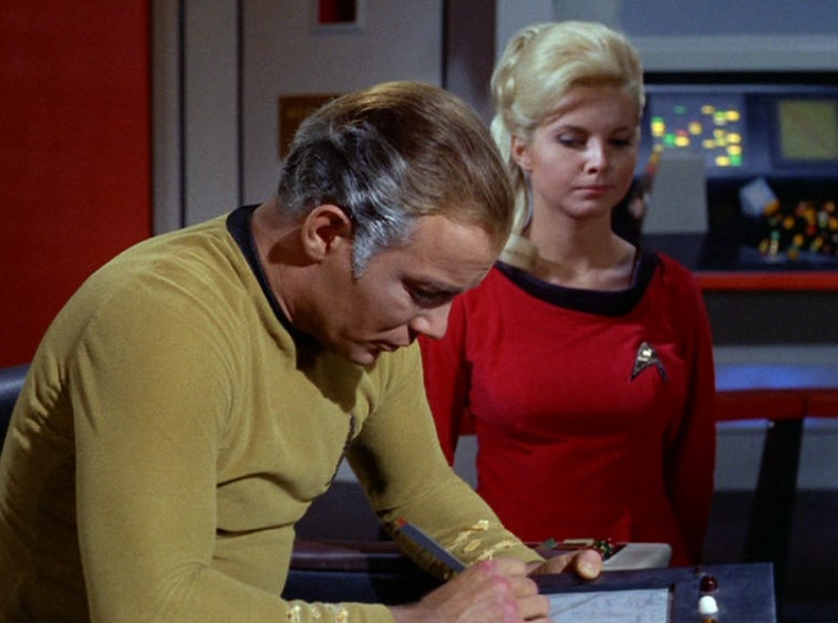 Captain Kirk signing an electronic document