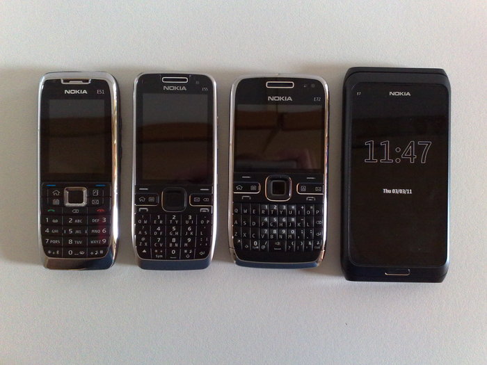 Generations of the Nokia Eseries family. Left to right: E51, E55, E72, E7-00