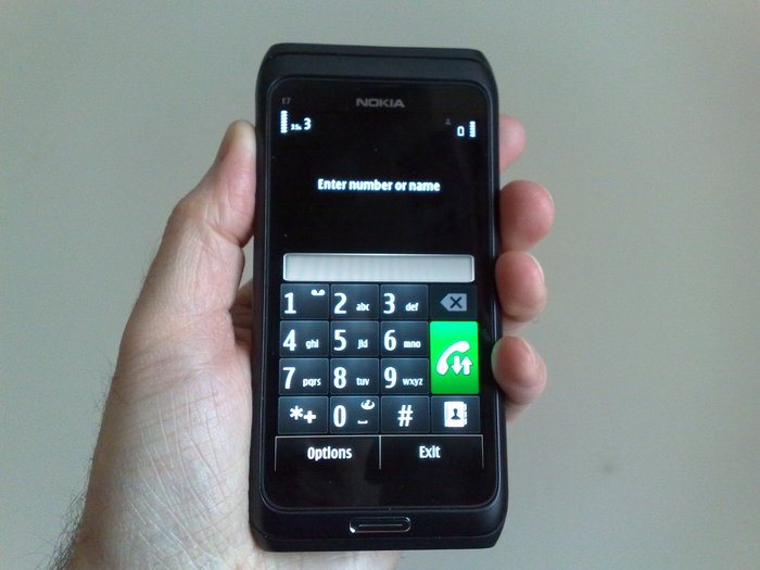 Giving a sense of scale to the E7. It feels large in the hand